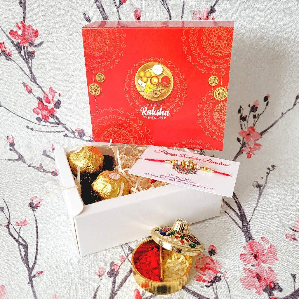 A simple & small Rakhi Set With Greetings & Chocolates