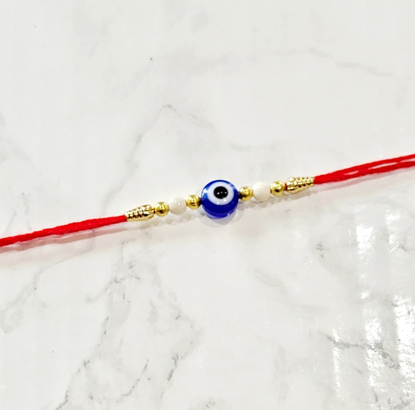 Evil eye Pearl Rakhi Rakhri bracelet, Rakhi, Simple Rakhi, Evil eye Rakhi