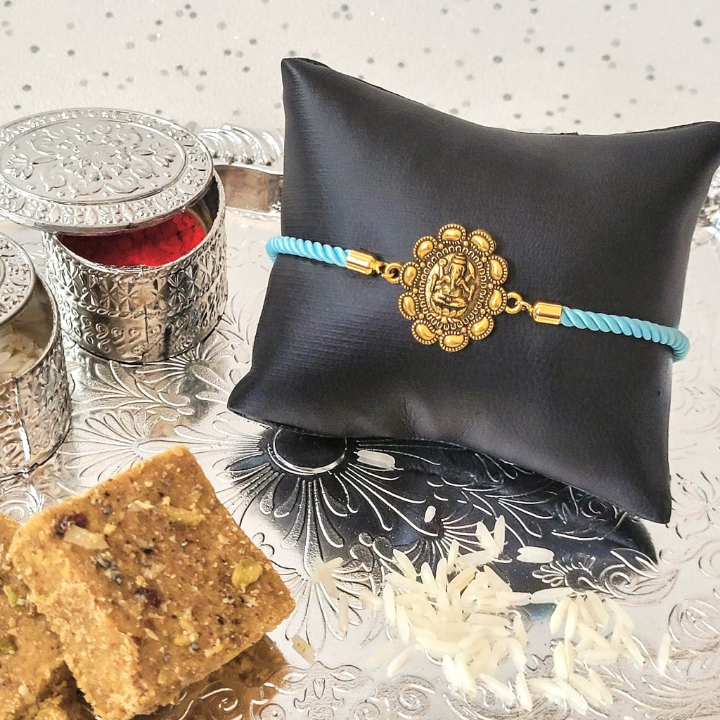 Gold Rakhi Adjustable Bracelet Lord Gajanan Pendant