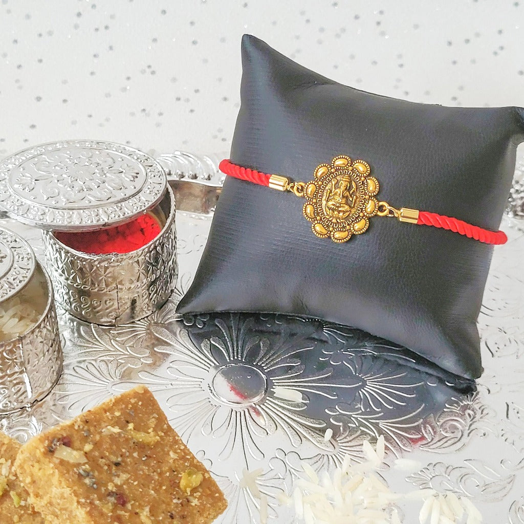 Gold Rakhi Adjustable Bracelet Lord Gajanan Pendant