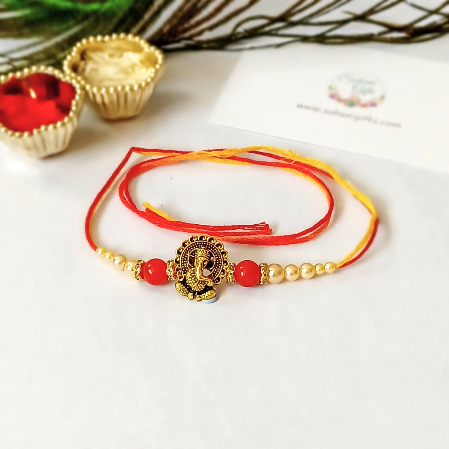 Traditional Rakhi thread pearl white beads Ganeshji pendant