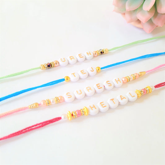 Personalised Rakhi/Rakhri, Raksha Bandhan, Gold and White Letter Beads