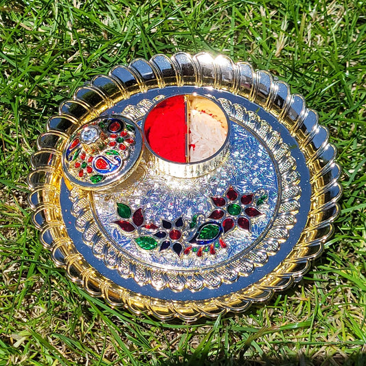 Thali with kumkum and Rice Dibbi