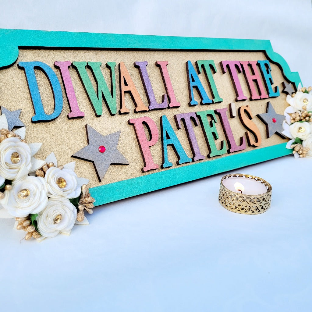 Colourful Personalised Diwali At The .. sign with floral finishing for Diwali decoration and gift
